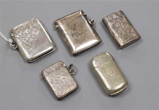 Four assorted silver vesta cases and a plated vesta case.